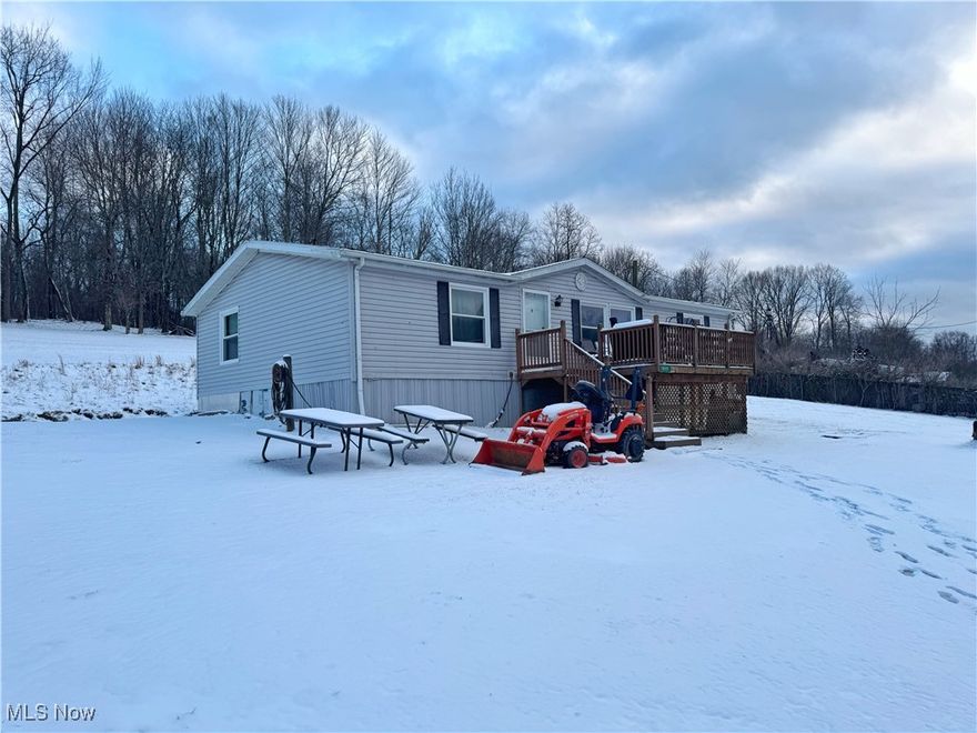 This versatile 2.7-acre property offers two separate residences, providing flexibility and strong potential. The double-wide mobile home is fully livable and features 3 bedrooms, 2 bathrooms, laundry hookups, central air, and an updated bathroom with an all-electric setup. The second home has its own fully connected utilities, updated 200-amp electric service, oil heat, and a full wood-burning stove in the basement, but will require updates, including a complete bathroom renovation. With ample land and multiple living options, this property is ideal for owner-occupants, investors, or those looking for future improvement opportunities. Schedule your showing today to explore the possibilities.