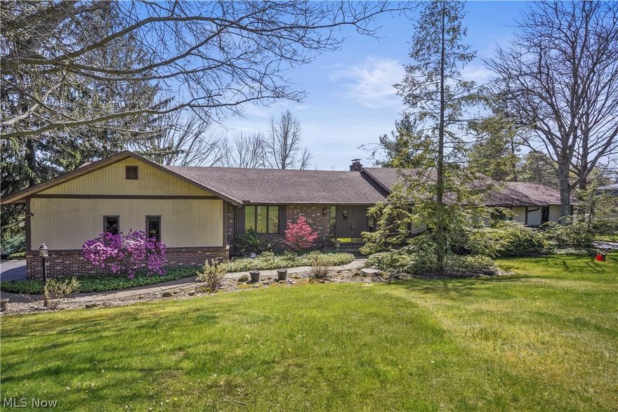 Welcome to your dream home.  This contemporary, waterfront ranch on Lake Martin in Sugarbush Knolls is a true gem and one of a kind!  The stunning views from most of the rooms is just gorgeous and the original owners' design touches and beautiful woodwork give it a unique character.   Enter the open foyer and see that million dollar view as you enter the home.  The crown molding throughout most the first floor adds an elegant touch, enhancing the home's appeal. The living room features crown molding, gas fireplace with beautiful custom mantel and is open to the family room, which then leads to a spacious dining room with a huge pantry.  The eat-in kitchen offers plenty of cabinet and granite counter space.  There's even a pass through to the dining room, which is super convenient for those holiday dinners.  The master ensuite with a walk-in closet plus two additional closets offers ample storage space and privacy. The linen closet opening up to the third garage is a thoughtful addition, making it convenient for outdoor activities.  The other two bedrooms are good size and have nice closet space as well.  The walkout lower level offers an abundance of windows and slider doors allowing that water view to be a fantastic feature, providing a seamless connection to the outdoor environment. With plenty of sliders to open up and let in the cool breeze, it will create a refreshing atmosphere, especially on warm days.  This area could be an additional living space with the wet bar and powder room.  The laundry room is also huge with walk out to the patio and there's tons of storage.   Having a split garage with both an attached two-car garage and an additional garage (you may be able to store your camper or RV in this garage) adds practicality and versatility, providing ample space for vehicles, tools, or recreational equipment. New furnace and AC - 12/22.   Home warranty is being provided by the seller.