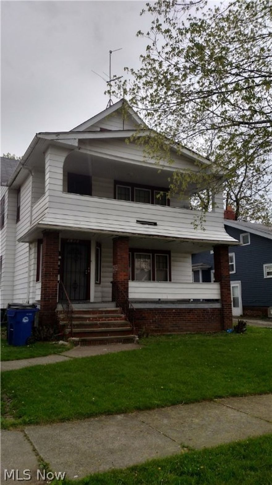 Large spacious colonial with living rooms, dining rooms, two bedrooms, hardwood floors on each level.   Large basement for storage.  The home needs some exterior updates but it has a lot of potential.