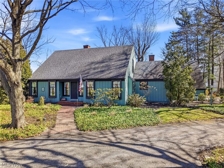 Owned by original owner. Quality built by local contractor George Crawford. Storybook setting - sits back off street. Professional landscaping and outdoor lighting. Pella windows. Gorgeous hardwood flooring. Large 20 x 17 great room with open wood burning or gas fireplace - built-in cabinet and bookshelves. Crown molding all over. Living room has padded window seat. Kitchen - granite counter top plus 2 sinks plus pantry - all appliances and Jenn-air grill, wood floor. Opens into dining area with built-in cupboard plus an alcove. Family room lots of windows and a loft. Master bedroom suite has walk-in closet, extra sink, and storage into full master bath with walk-in shower plus seat and extra shower heads - make-up desk. Don't forget upstairs 2 oversized bedroom with desk area, numerous closets, walk-in storage. Extra storage in dormer areas plus attic storage. Also 2nd floor bath. Laundry room extra storage, sink, and wet area. 2-car garage is wood paneled and heated. Don't wait!