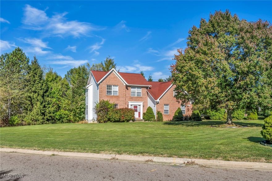 This elegant Colonial-style residence is located on a desirable over sized, corner lot in the Wedgewood Phase II community, within the highly regarded Copley-Fairlawn school district. 
Boasting 4 bedrooms, 2 full baths, 2 half baths, and almost 2200 square feet of living space, this 1996-built home offers both style and functionality. 
A welcoming foyer flows into the formal living and dining rooms, both featuring quality finishes, real hard wood floors and lots of natural light. The kitchen showcases granite countertops, tile flooring, and an eat-in area with sliding glass doors opening to the backyard deck—perfect for indoor-outdoor entertaining. 
The kitchen opens to a dramatic family room with vaulted ceilings, two skylight, and a cozy woodburning fireplace—ideal for gathering on colder evenings. A convenient half bath and main-level laundry room round out the first floor. 
Upstairs, the primary suite features vaulted ceilings, a walk-in closet, and its own private full bath. Three additional bedrooms are served by a second full bath. 
The fully finished, carpeted lower level adds extra living space—perfect for so many possibilities. The basement includes an additional half bath. 
Exterior highlights include a 2-car attached garage, mature landscaping, and the benefits of a corner lot for better sightlines, light, and curb appeal. 
Don’t miss this rare opportunity to own a spacious, well-appointed home in a sought-after community with top-tier schools, ample living space, and desirable amenities.