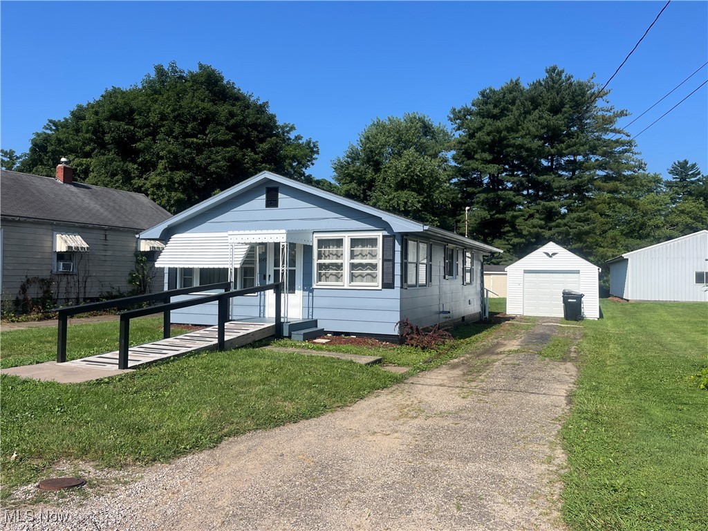 Well-Kept Handicap Accessible Ranch Home in Maysville Schools, on level lot with covered back porch and detached garage with workshop! Home features 3 bedrooms and 1 new bath, first floor laundry, many updated floors, public utilities, no basement and Electric baseboard heat, makes this home easy to maintain! For additional storage shed in back for your extras!