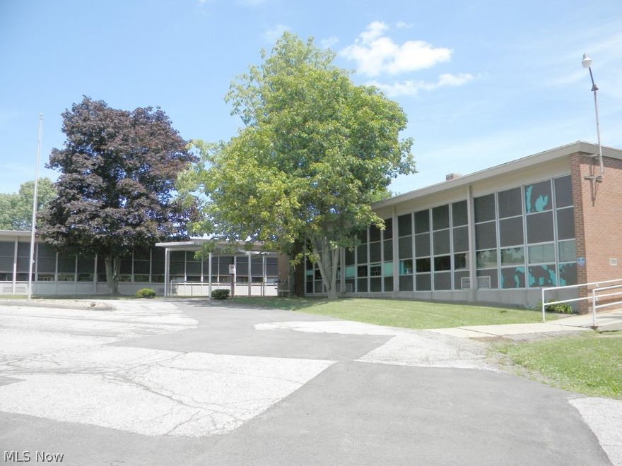 Former Elementary School 25,540 SF. One Story; 4.8 Acres of land; playground could be buildable lot; ample parking; gymnasium with 17' ceiling; kitchen; cafeteria; In addition to obvious educational use, building could be utilized as; Training Center, Data Center, Call Center, church, Medical/Care Facility, etc.; Built 1955.

PRICE REDUCED:
was: $350,000
now: $300,000
