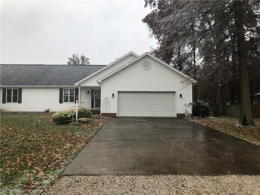 One floor living in a spacious 2 bedroom condo! Walk into the foyer to the open floor plan, living room has a cozy fireplace and opens into the fully applianced kitchen with a breakfast bar! First floor laundry and another room with sliding glass doors opening to the deck. Both bedrooms have huge walk-in closets! 2 full baths!! Master-bath has a tub and second bathroom a walk in shower. Huge unfinished basement with tons of potential! Schedule a private showing today!