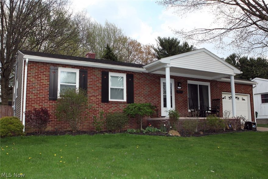 Beautiful updated brick/vinyl sided 3-4 bedroom ranch home in quiet neighborhood has hit the market!!! Gorgeous kitchen with newer counter tops, fixtures and re-finished cabinets and newer laminate flooring and nice open eat in area. Living room with fresh paint and carpet. 3 bedrooms up with hardwood floors throughout and updated bath. Finished basement with family room and additional 4th bedroom. New enclosed sun room added 2015!! Updates include central air-2012, siding-2014, windows- 2005, new cement front and back porch 2015, electrical updated 2009 and much more!!!! Fenced in yard and 1 car attached garage!! So much to offer better HURRY!!!