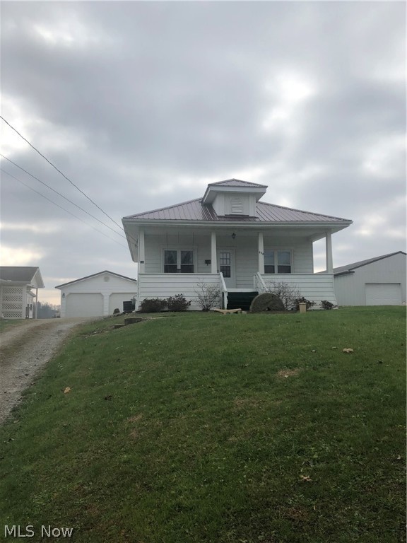 3 bedroom 2 bath home located in town McConnelsville. This home has several updates including a 2 car detached garage, windows, roof, central a/c and electric box. With a little paint and carpet, this home could be the home of your dreams! Includes a walk in tub.
