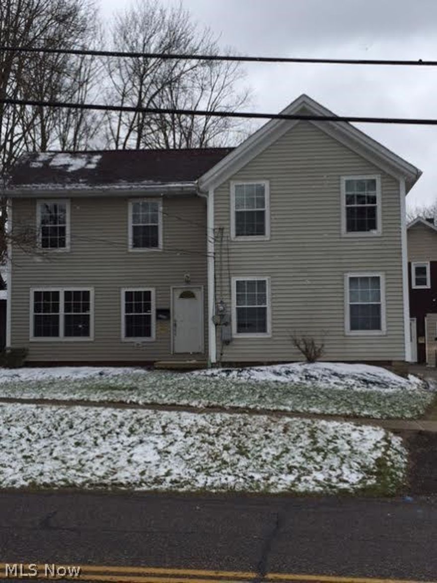 Large 3 bedroom home in historic Garrettsville with unique river views.  Many updates including windows.  Spacious kitchen with lots of storage space and island.   Move in ready!