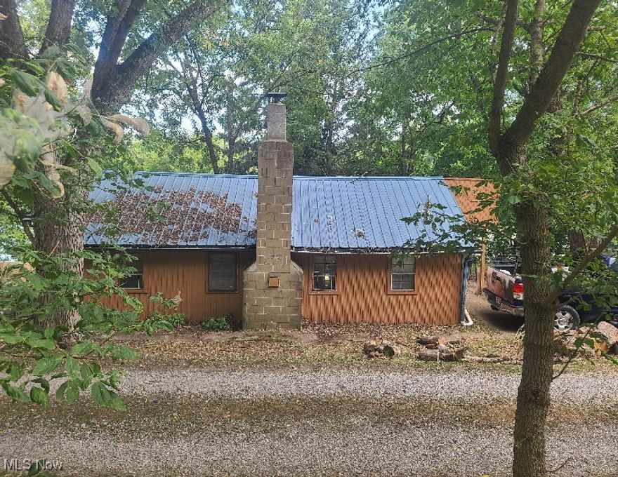 Welcome to your riverfront home on the Muskinghum River! Situated on .89 acres, this 2 bedroom ranch boasts 187 feet of river frontage with beautiful views right from your back deck. Imagine walking right out your back door for an evening spent fishing or relaxing! The property is located in a flood plain, but the owner has no knowledge of it ever flooding. Being sold As Is.