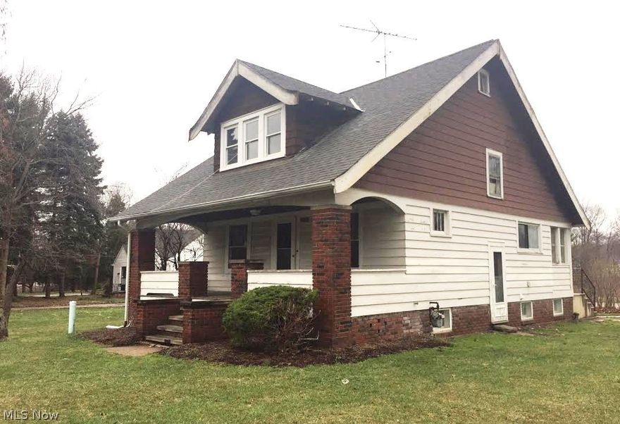 Vintage Cape style home features original woodwork along with its original character and charm.  Hardwood floors, fireplace and built-ins complete the first floor.  Three Bedrooms and one and one half baths.  Full basement with utility area.  The yard is very deep and offers great possibilities.  Located close to Metropark.   Unique home waiting for a new owner to restore it to its former glory!!  This is a Fannie Mae Homepath property.  All information is approximate