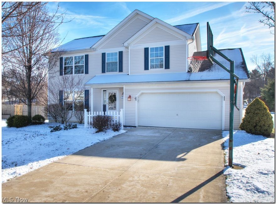 There are Move-In ready homes and then there is 242 Simon Lane!  Newer, wide-plank, hand-scraped laminate floors on the entire 1st floor greet you as soon as you walk in the front door!  Freshly painted with today's colors and white woodwork to set off the dark floors*Foyer is open to the Liv Rm and Din Rm all boasting crown moulding*Kitchen features all stainless steel appl, white cabinets, a fam dining area and is totally open to the Fam Rm*Cozy up to the Floor to ceiling stone gas logged FP on those winter nights*The sliders lead to an oversized deck with a distinctive covered area by the above-grnd pool*On those sunny days you will love, love the retractable awning turned on or off from the fam rm*Upstairs Vaulted Master has a spacious walk-in closet and a glam bath with corner spa tub, walk in shower and separate water closet*Three addl bdms, all good sized and a family bath complete the 2nd flr*All bdrms have ceiling fans*The LL is finished with newer carpet, a built-in area for the wide-screen, equipment, DVDS, Blue Ray and wired for sound*Craft area and cabinets are great for toy, game or craft storage*Washer and Dryer included*Large pantry in the 1st floor hall can be a laundry closet*Plbg in place*The backyard is larger than most, great garden area started with views giving you a great feeling of privacy yet so close to the Square, shopping & new trails off of S. Broadway! Shed with electric and water for the gardener*All that's left is to pull up that moving truck!