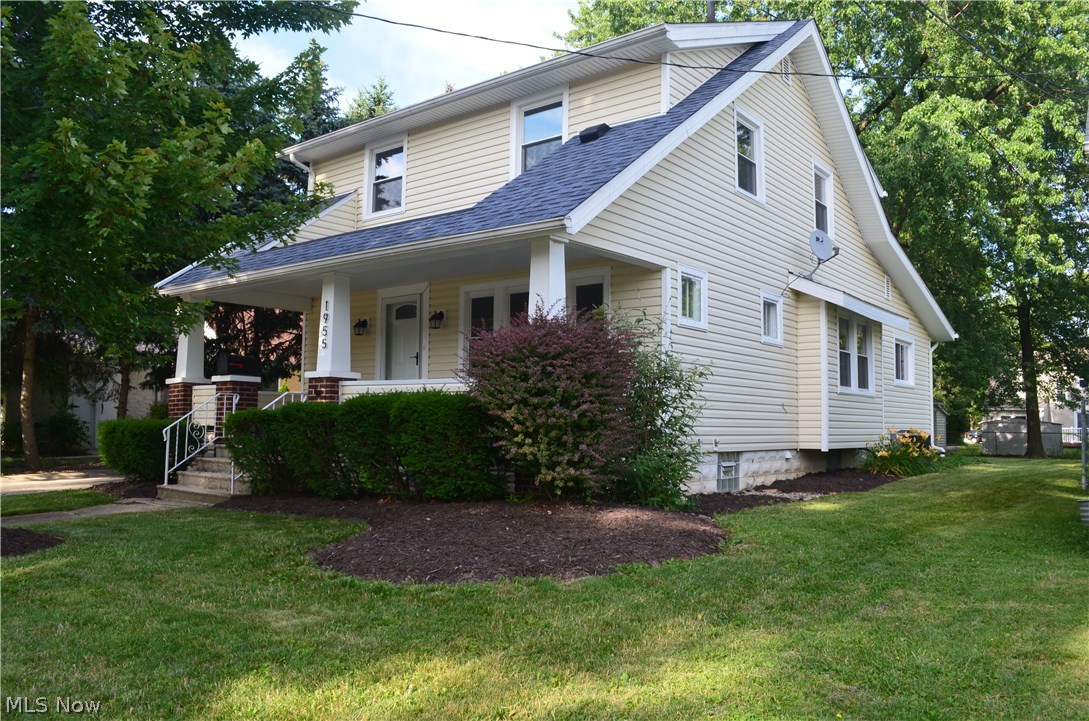 Welcome home to this beautiful Cuyahoga Falls Colonial! You will first be greeted by an open, cozy and charming front porch. Then as you walk through the front door you can't help but notice the refinished original hardwood floors throughout. This four bedroom home boasts a first floor master with a full bathroom that could also be used as a den or large office. Then walk into the captivating brand new kitchen with all new stainless steel appliances and granite countertops. Continue to see gorgeous new light fixtures and finishes throughout, with two completely renovated bathrooms and 3 more spacious bedrooms upstairs. The two car garage compliments a picturesque backyard. Complete with all new windows, roof replaced in 2014, hot water tank, furnace and ac replaced in 2013. You won't be able to say no to this home located in prime Cuyahoga Falls location, within walking distance to downtown and a short distance to all that Portage Crossing has to offer! Call to schedule your showing to