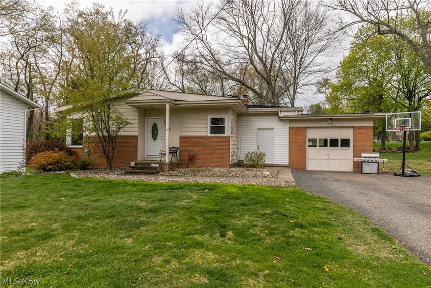 A delightful Stow ranch with 3 bedrooms and 2 full baths, this wonderful home has a fully finished basement with a full bath.   This wonderful home has vaulted ceilings in the formal living room, as well as natural wood floors.  The wood runs through the bedrooms as well.  A remodeled kitchen also has formal dining with a fireplace.  An attached garage, breezeway, .36 acre lot, and so much more.