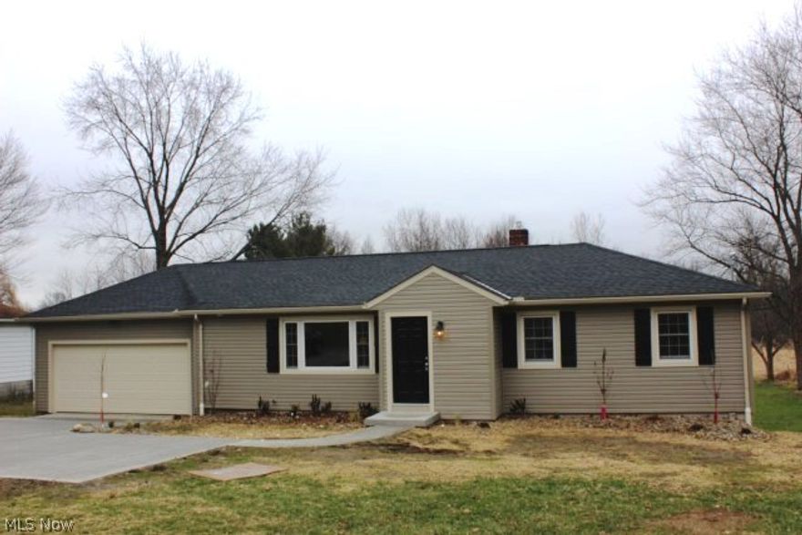 Beautiful, like new 3 bedroom, 2 bath ranch w/1st floor laundry, full unfinished walkout basement (ready to be finished) & attached 2 car garage on .93 acre lot* Kitchen w/granite counter top, stainless appliances & pantry* 2013 updates include kitchen, bathrooms, drywall-walls  & ceiling, trim & doors through out* 90% efficient furnace, C/A, 35 yr shingles (single layer), gutters & downspouts, siding, softener, well pump, garage doors & opener, driveway, insulation, & deck* Windows approx. 5 yrs* Dining area w/slider to new deck* 1st floor laundry w/cupboard & granite counter top* Lovely neutral décor* Quality workmanship* Absolute move in!