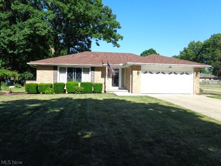 Spacious Brick Ranch!! Totally Remodeled and Ready to Move right Into!! New Wood Laminate Flooring!! New Kitchen!! Newer bathrooms!! Nature Stone Garage Floor!! Large Deck and Patio!! Jacuzzi Tub In Master Bathrm!! Newer Roof, Furnace, Central Air, H2O tank!! Updated Electrical Box!! Newer Kitchen Appliances Stay!! Desirable Area--close to everything!! Nothing To Do But Move Right In!! Wont Last!!