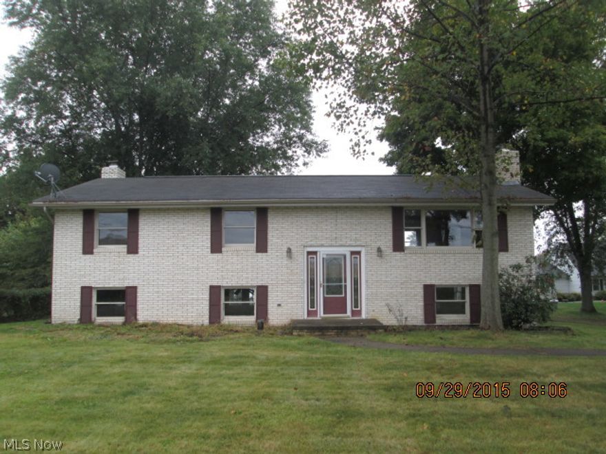 Brick bi-level, 3 bedrooms, 2 full baths, 2nd kitchen in basement, walk out basement to covered patio.  2 car detached garage with extra storage plus storage shed.  Includes two parcels.