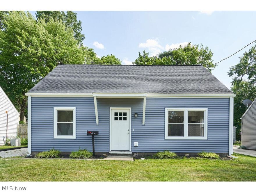 Welcome to 404 Morrison in Cuyahoga Falls ! This 4 bedroom cape cod has been completely updated inside and out! The updates include new vinyl siding, roof, doors, windows and light fixtures on the outside. Inside you will find all new walls and flooring as well as a kitchen cabinets, formica countertops, and stainless steel appliances. New plumbing and electric throughout. Tankless hot water tank.  This home is totally updated and just waiting for new owners!!