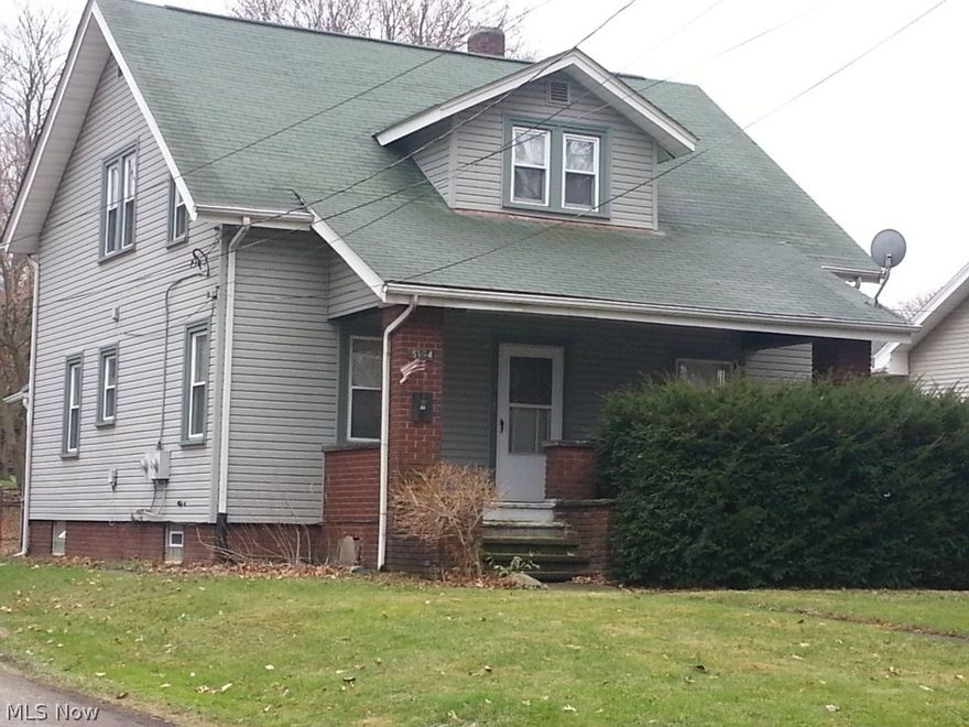 Great duplex in Perry. Live in one unit and have upper unit pay your mortgage. Very well kept and clean unit. The main floor unit has super large kitchen with updated cabinets. Open living room with lots of character. Full front porch and large partially fenced in yard. Upper unit is really cute and full of character. Great for single or young couple. Separate utilities; owner only pays water, sewer & trash. Oven, range and refrigerator up & down stay with property. Baseboard electric heat up & forced air heat down unit.. Window air in upstairs unit.  Basement Waterproofing professionally done in July along with new paint and in downstairs unit.  New downspouts also.  Ready for you to move in and let the upstairs tenant make your payments for you. Carpet upstairs new and fully rented for $450.00 per month.