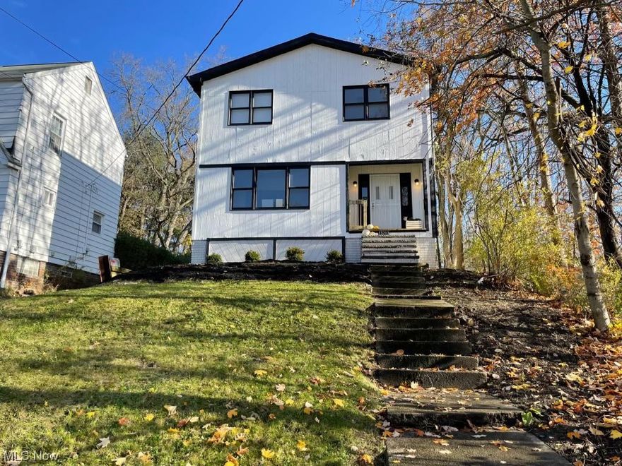 Introducing a stunning, fully remodeled 4-bedroom, 2.5-bathroom home in the highly sought-after Garfield Heights neighborhood. This spacious gem boasts an impressive 2,180 sq ft of living space, making it a rare find compared to other homes in the area.

Step inside to discover an open-concept floor plan featuring brand new LVP flooring and plush carpeting throughout. The heart of this beautiful home is the stylish, modern kitchen, complete with gleaming granite countertops and top-of-the-line appliances that will inspire your inner chef.

This exceptional property stands out with not one, but three outdoor decks! Enjoy your morning coffee on the deck off the main level, entertain guests on the second level, or unwind after a long day on the full deck adjacent to the garage in the backyard. These inviting spaces offer endless opportunities for relaxation and entertainment.

The deep driveway leads to a spacious two-car garage, providing ample parking and additional storage for your convenience.

Don't miss the opportunity to call this extraordinary Garfield Heights home your own. With its unique size, high-quality finishes, and multiple outdoor spaces, this property is truly one-of-a-kind. Schedule a private showing today to experience all that this remarkable residence has to offer!