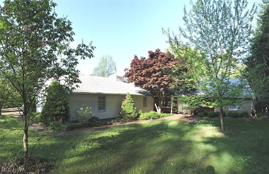 3 bedroom, 2 full bath ranch located in North Hills, offers complete 1st floor living, lot w/mature trees for privacy & just minutes from I-77 & downtown Marietta.  Features covered front porch, entry w/guest closet, light & airy living room w/large picture window overlooking the backyard and GLFP, dining area w/large front picture window overlooking front yard and space for a wall hutch, kitchen that offers abundance of cabinetry, good counter space, large island for your bar stools with drawers and cabinets for storage and is open to the family with window walls (all new windows) allowing natural light to enter the room and door to concrete patio area for relaxing or entertaining.  Conveniently located laundry room is off the kitchen and offers washer, dryer, sink, cabinetry and door from driveway to make unloading your vehicle with groceries easier to carry into the kitchen.  Private home office that features great space for furniture and wall built-ins. Tucked back the hallway are