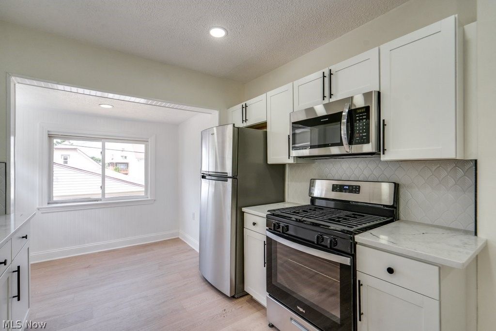 Photo of 2406 Tampa Avenue, Cleveland, OH 44109 (MLS # 5211019)