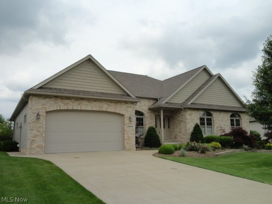 Custom built Villa with nice open plan, 2 Bedrooms & Office on 1st floor and 3 additional Bedrooms, full Bath & Rec Room on lower level, perfect for visiting family & friends.  Large Great Room & Kitchen, Dining Room & year round Sun Room.  Covered back Porch & charming Patio are overlooking beautiful gardens & water feature.  Huge walk-in closets off luxurious Master Suite, security & sprinkling systems & stairs from Garage to Basement.