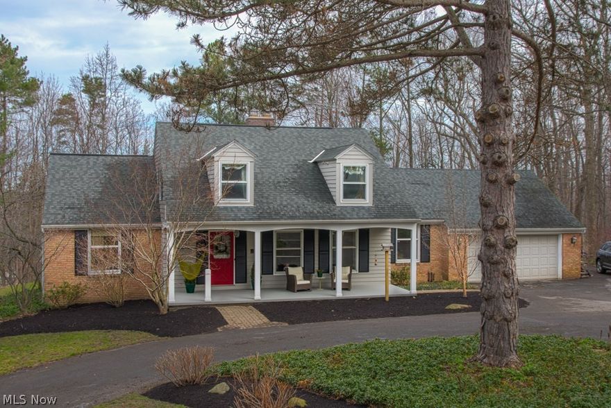 This Beautiful 4/5 Bedroom Cape Cod On A 1.38 Acre Wooded Lot That's Situated On A Quiet Peaceful Cul-de-Sac Is Waiting For You* Spacious Kitchen Features A Breakfast Bar And Opens To Family / Hearth Room With Wood Burning Fireplace* 1st Floor Master Features  Expansive Walk-In Closet And Updated Private Bath That Features "His & Her's Sinks" And Gorgeous Slate Tile Flooring And Shower* Large Formal Living Room w/ Custom Built-In Desk And TV Stand Leads To Formal Dining Room w/ Bamboo Flooring* Updated 1st Floor Powder Room Features Travertine Flooring, Custom Made Sink And Travertine Mosaic Tile Wall* 3 Generous Sized Bedrooms Adorn The Second Floor Along With An Additional Children's Playroom That Could Be A 5th Bedroom* Updated Main Bath w/ Travertine Flooring And Custom Tile Tub Surround* Finished Walk-Out Lower Level* Vaulted Ceiling Screened In Covered Patio* Large Outdoor Deck And Fire Pit Area And So Much More* This Is A Quality Built Home From Top To Bottom And Meticulously Ca