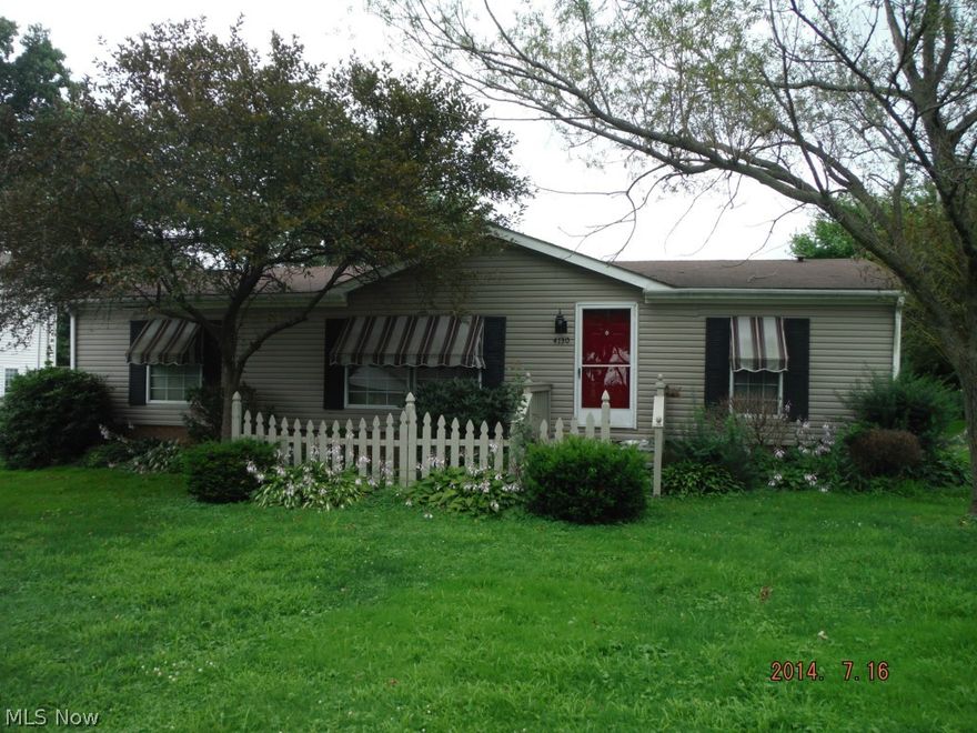 3 bedroom, 2 bath modular home with 2 car detached garage and nice deck.  Open and spacious living room and dining room.  Split floor plan, master bedroom on one side and 2 other bedrooms on the other side of home.   Private backyard . Perry schools.  Needs a little TLC.