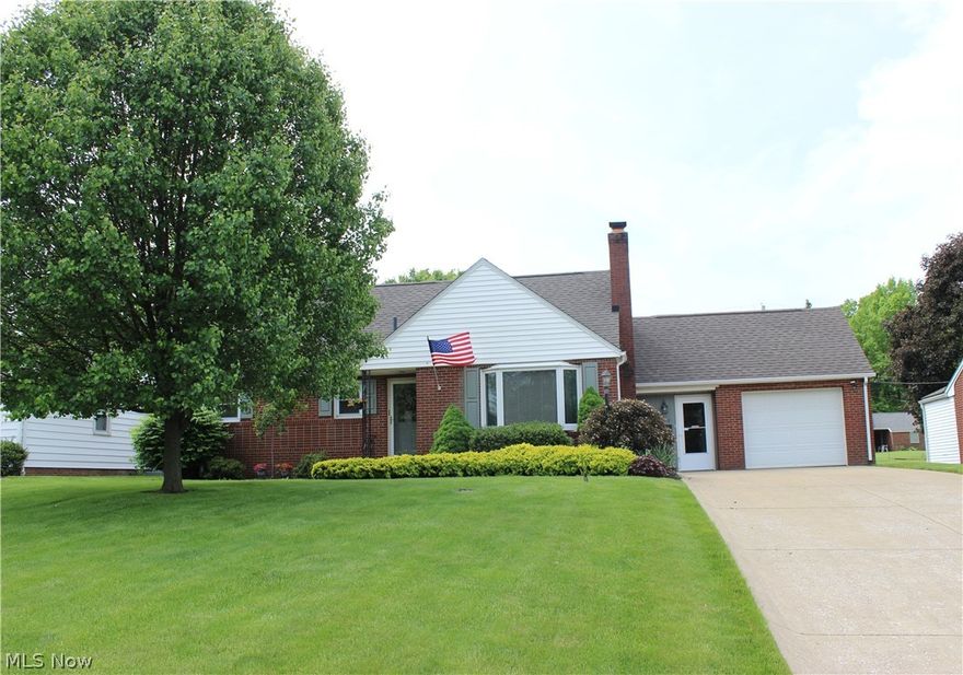 Delightful is the best word to describe this move in ready home, both inside and out! This spacious brick bungalow in the Shrine Village is in spectacular condition from top to bottom. You'll love the large openness of the 1st floor Kitchen/Dining/Sunroom space with it's gorgeous wood flooring. The stainless steel appliances enhance the Kitchen's modern look and feel, and this space truly has nice countertop space and a closet pantry area. Walk out onto the gorgeous backyard  and enjoy the nice deck, storage shed w/electric and beautiful landscaping. The handsome Living Room has a masonry fireplace with gas logs, and there are two 1st floor Bedrooms and a 1st floor  Bath. Upstairs, there are two more spacious Bedrooms with awesome built-in dressers, and a totally remodeled 2nd floor full large Bath. The lower level finished Recreation Room is big, and a great spot to relax and enjoy casual living,  and it includes a bar sink. The spotless unfinished basement offers nice storage, with W