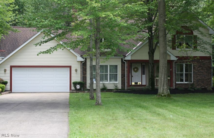 Turn key ready! Spacious and well maintained 3 bedroom, 3 bath colonial in Midview District on River Ridge Court; plenty of room for entertaining family and friends in Great Room w/gas fireplace, family room w/wood fireplace and cathedral ceiling, living room, dining room and large eat in kitchen with plenty of countertop and oak cabinets, along with desk area. Also included; crawlspace electric air cleaner and humidifier. Open foyer leading upstairs to area overlooking family room; master suite including a separate vanity area w/cathedral ceiling and skylight, and separate jetted garden tub area for relaxation and privacy; large maintenance free Trex deck off the rear of home overlooking large wooded back yard w/storage shed; enjoy the woods directly behind and to the east of home. Full unfinished basement awaits your imagination and creativity. Recent improvements; roof May 2006, hot water tank 2010. Living room and dining room curtain DO NOT stay; please remove shoes upon entering.