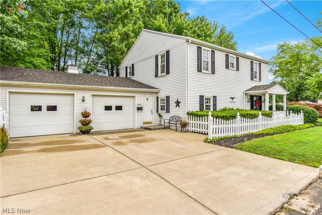 What a BEAUTIFUL home! Located in the heart of Austintown, this 3 Bedroom, 2 Bathroom home is the GEORGOUS Classic Colonial Style with a white picket fence and all. When you first walk into this BEAUTIFUL home it opens up into a large living room great for entertaining. From the living room walk into the large entrance that leads into the dinning room, which is perfect for Holiday's and Sunday dinners for all to gather at. The Dinning room will take you straight into a WONDERFUL updated kitchen with lots of cabinet space to fit all of your pots, pans and kitchen gadgets. The kitchen also features a dinette area, which is perfect for all of your day to day meals. The upstairs has 3 large bedrooms along with a large laundry room, now who doesn't love that! Did I mention the Family Room? Yes, there is additional room for entertaining, lounging out, mancave or more! Plus right off of the Family Room, for an added bonus, is a lovely Sun Room with its own entrance to the Park-like setting o