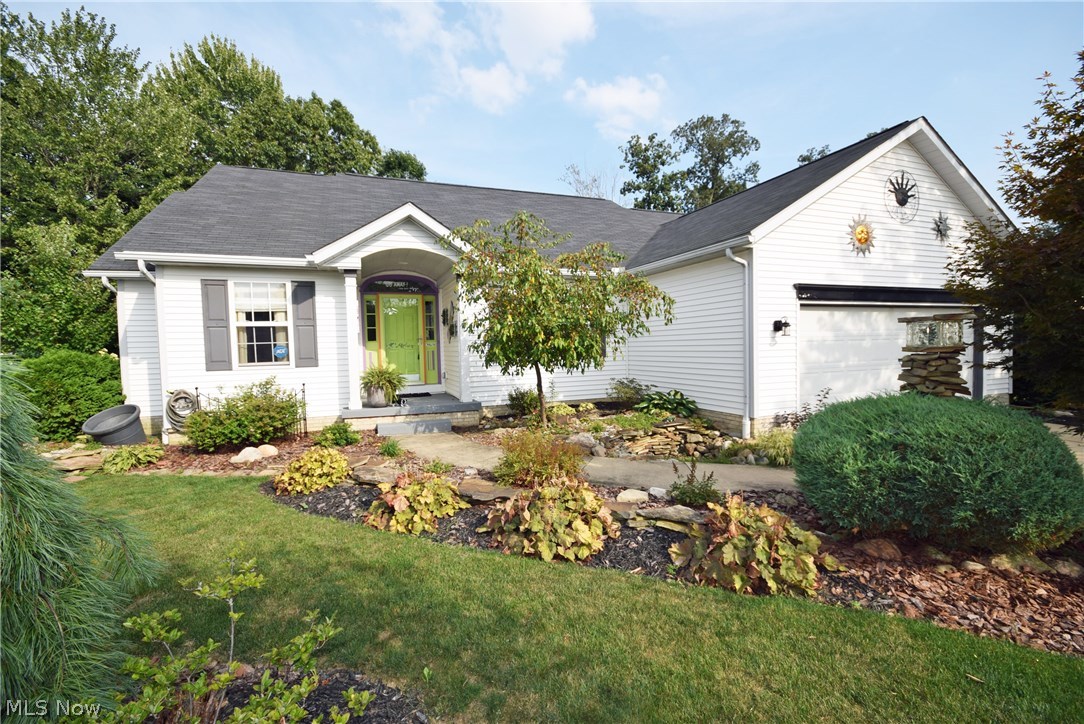 Check out this one of a kind split bedroom Ranch! This home is meticulous inside and out with pristine landscaping from front yard to back. The entrance to this home has a large foyer area that opens to the formal dining room and spacious great room. The fabulous great room boasts a vaulted ceiling and a stone gas fireplace which opens up into sun lit updated kitchen with eat-in area, bayed windows that overlook the spacious private back yard. Dining area walks out to spacious deck and stone patio. The left side of the house features the luxury master suite with vaulted ceiling, large windows and master bath. Master bath includes a soaking tub, double sinks, separate shower and large walk in closet that measures 12'x8'. The second "master suite" is on the right side of the house behind the garage and has full bath which is shared as the main bathroom via the hallway. 1st floor laundry. The basement has a complete work out area and an additional space designated for relaxing and enterta