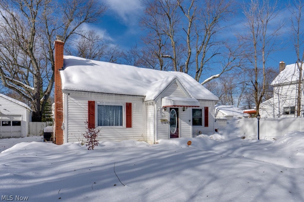 Welcome to this lovely 4 bedroom 2 full bath cape cod home located just minutes from Lake Erie. Come in from the cold and cuddle up beside the gas fireplace, situated nicely in the formal living room. Kitchen is lined with oak cabinets providing ample storage space. Kitchen also shares an open concept with the spacious family room addition in the back of home. Family room offers a gorgeous bay window and sliding glass doors that lead outside to the covered patio and fenced in backyard. There are two sizeable bedrooms conveniently located on the first floor. Second floor offers a second full bath and two bedrooms. Home comes with a Generac generator, furnace has been well maintained and recorded, and NEW hot water tank was installed in 2022. Plumbing available in basement for additional bathroom. Range, Refrigerator, Microwave, Washer, Dryer and Upright Freeze will transfer with the sale. Schedule a showing today so you can call this place "home" by Christmas!