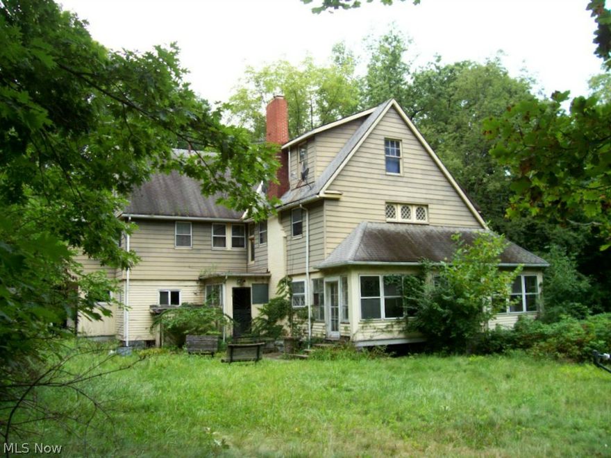 Park-like paradise in East Cleveland! Hidden at the very end of a private road on almost 4 acres, you would never guess these homes are here! 2 single family homes on one lot, ready to be renovated. The first home is a mansion, nearly 4000 sq. ft., full of interesting architectural details such as fireplaces, built-ins, intricate hardwood flooring. Listed as 8 bedrooms and 3 baths, this home could be transformed into just about anything--enormous private residence, possibly a group home, or other income property. The second home is also a single family, listed as 3 bedrooms and 1 bath, in need of complete renovation. Work has been started in the main home, electrical and plumbing is functional. This property also features a 2 car garage (need to be rebuilt) and Gazebo. One-of-a-kind property! Not bank owned or a short sale, investor-owned for easy transaction!