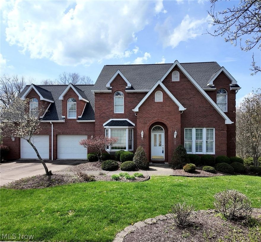 Don’t miss this exciting opportunity to own a well-built, mostly brick home, lovingly maintained by its original owner since 1992. Offering 2,246 sq. ft. of living space, this property features a full walkout basement and a large finished area above the garage—ideal for a fourth bedroom, hobby space, or additional storage.

The main level is designed for both comfort and functionality, featuring a spacious living room with a dual-sided gas fireplace, a formal dining room, and a well-appointed kitchen with custom cabinetry and newer appliances. You’ll also find a convenient half bath, laundry room, and access to a rear deck overlooking a private backyard complete with a small creek and direct views of the National Road Bikeway.

Upstairs, the primary suite offers a generous full bath with double vanity, jetted tub, separate shower, and walk-in closet. Two additional bedrooms share a Jack-and-Jill bathroom and provide access to the finished bonus space above the garage.

The full walkout basement boasts high ceilings, offering excellent potential for future finishing or additional living space.

Situated in a quiet neighborhood on the edge of town, this home combines peaceful surroundings with convenient access—just minutes from I-70, SR-9, and SR-40, only 0.2 miles from the National Road Bikeway trailhead, and close to the Ohio Valley Mall, dining, and shopping.

Additional features include electric utilities, gas forced-air heating, central air, gas fireplace, smart water heater, reverse osmosis water system, and public water and sewer.

Schedule your showing today and see everything this exceptional home has to offer!