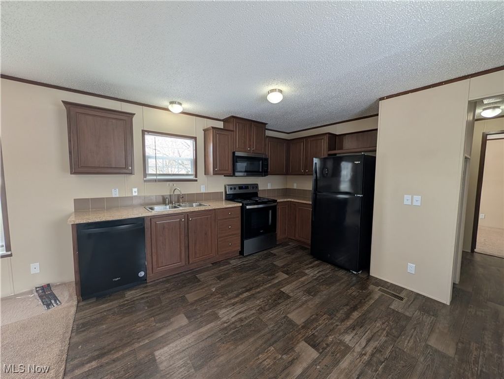 Photo of 235 Chaucer Ct, Elyria, OH 44035 (MLS # 5183304)