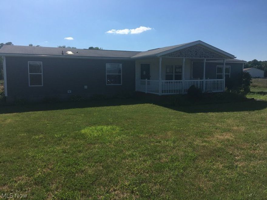 3 bedroom home located on 5 acres thats wooded with a stream...kitchen has an island and the family room has a fireplace for cozy winter evenings.  Large master bedroom with master bath.