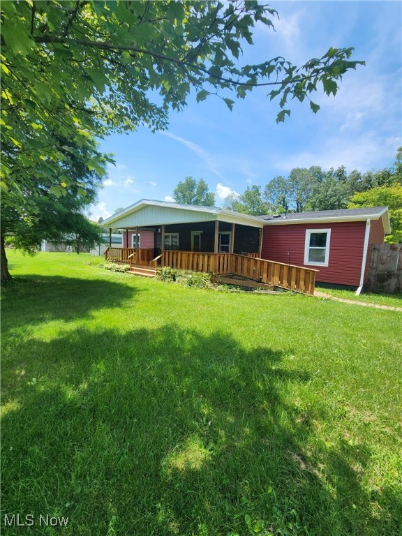 Welcome to 67660 East Lofland Road in Cambridge, a haven of tranquility & endless possibilities! All on one level this 4 BR, 2 BA home rests on 3.267 acres, offering expansive space for everyone Inside & Out! Entertain & Relax on the spacious front porch enjoying views of a level & landscaped yard. The long gravel driveway leads to the 2 Car Garage & offers plenty of parking. Extra storage provided with a storage shed, & option for animals with the wood barn. Once inside, the Living Rm seamlessly flows to the Owner's Suite w/attached Bath. The utility Rm w/ Laundry is conveniently located off the BR & Kitchen, streamlining daily life. The Spacious, Open Kitchen comes with appliances offering abundant cabinetry, countertop space, & Dining area. Just off the Kitchen is the Large Family Rm. with Fireplace that leads to 2 additional BR's & 2nd Full BA. Also, just off the Kitchen is a newer added addition that could be a 4th BR, Office, or Flex Space! Don't miss out! Call your agent today for all showing!