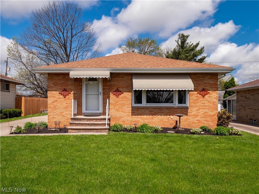 Photo of 12305 Eastwood Boulevard, Garfield Heights, OH 44125 (MLS # 5206129)