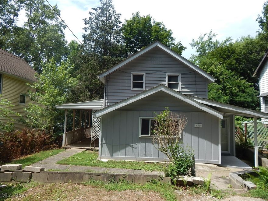 Quite cul-de-sac two story home. Featuring 2 bedroom with newer carpet and full bath on second floor. Large living room and open to dining room. Full size kitchen with extended counter space. Full size basement with walk out access. Large covered deck overlooking nature and rear slider access. Affordable and near parks, nature and schools.