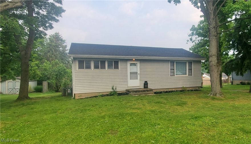 Step into this cute two-bedroom ranch, offering a  comfortable, easy-living layout. The eat-in kitchen provides a perfect spot for  meals, while a bonus room with built-in cabinetry adds flexibility—ideal for a mudroom, pantry, or potential first-floor laundry conversion. Step out from this space onto a deck (needs work and is ready for your personal touch), overlooking a spacious and well-kept backyard—perfect for relaxing or entertaining. Downstairs, the finished basement offers two versatile rooms—great for a recreation area, home office, gym, or anything else you envision. A detached 2-car garage completes is a nice bonus.  Roof replaced November, 2024.  Whether you're starting out, downsizing, or investing, this home offers cozy comfort and great potential.