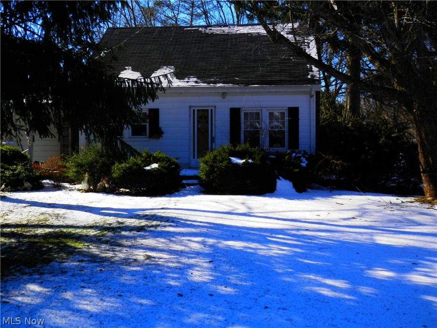 This charming home is an excellent investment opportunity or starter home. The home is on parcel #58-00633 but also comes with 58-00632 (each .43 of an acre) totaling .86. The  house is listed as a 2 bedroom, but has a large open room upstairs that was also used as bedroom and one of the lower level bedrooms has a large walk in closet that can be left as is or could provide room to expand the bathroom if desired.