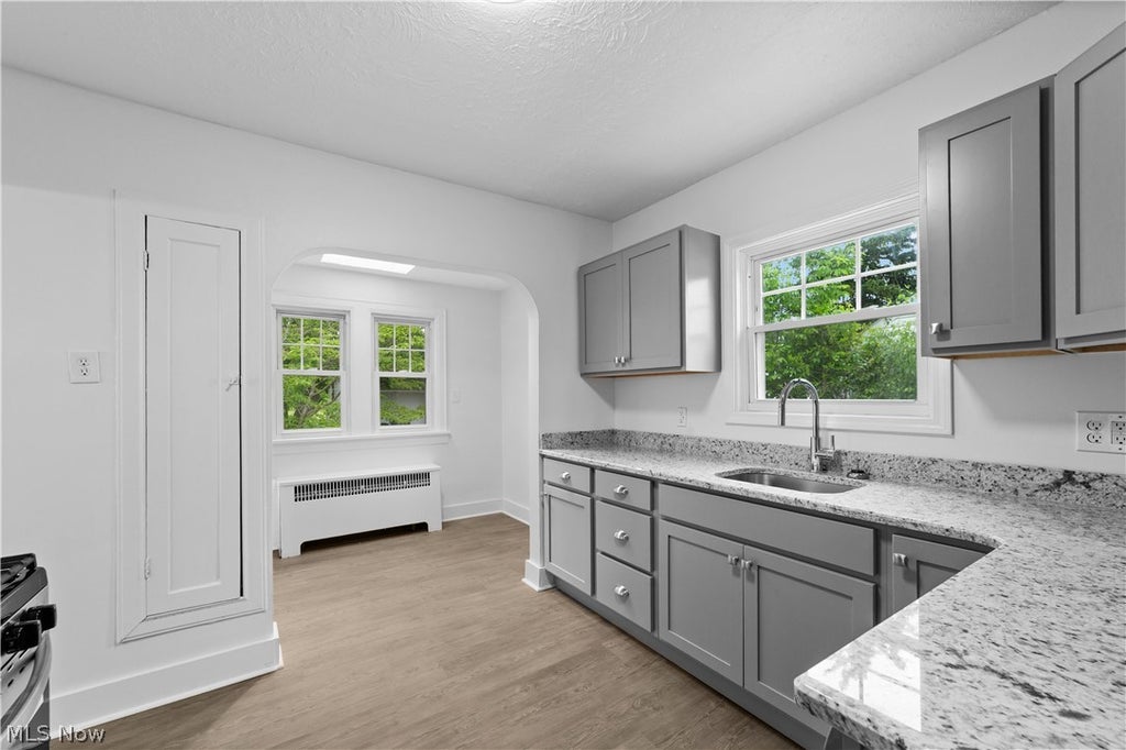 Photo of 1409 Mayfield Ridge Road, Mayfield Heights, OH 44124 (MLS # 5214609)