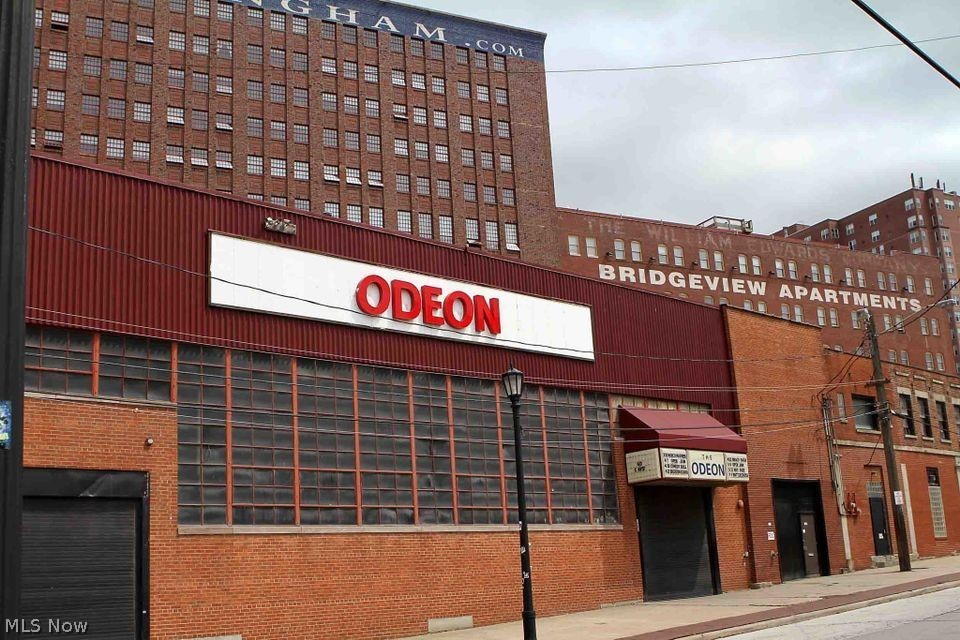Situated along the Cuyahoga River, on the East bank of Cleveland’s Flats entertainment district is approximately 15,700 square feet of retail space. The space consists of 3 historic buildings, one , a former Buffalo Wild Wings, now the Daiquiri Bar and Grill, and the Odeon and its companion building. In
addition, and also included is approximately 1882 Sq/ft of vacant land, currently used as a small parking lot.The Odeon is one of Cleveland’s premiere small concert venues, which after being closed for a while was reopened as the historic Odeon Concert Club. The concert venue has a main floor which can hold 850 people and a balcony which will hold another 150. The building can be purchased either with or without the business, which is owned by the building owner.The Daiquiri Bar and Grill opened in 2022 and consists of approximately 4000 Sqft. Of space. The tenant is included with the building.