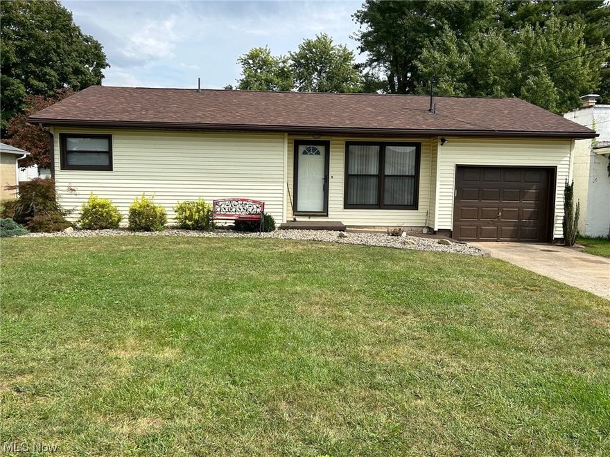 First time offered on the market. Well maintained ranch offers 3 bedrooms, 1.5 baths. Living room offers oversized picture window allowing lots of natural light, eat-in kitchen with exit to a large patio area and a flat backyard with alley access.  Spacious first floor bath offers a separate soaking tub area from a walk-in shower/toilet area.  Finished family room in lower level (there is an old fireplace along the backwall that has been drywalled over) with area that used to be a wet bar and half bath.  Auditors site shows home was built in 1900 but completely remodeled in 1990. Roof new in 2022.  Single car garage with exit to back patio.  Home offers an abundance of storage space.