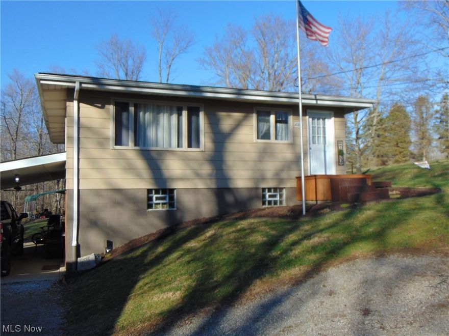 This one is a MUST SEE! Very well maintained 3-bedroom home in a country setting. This home features a newer eat in kitchen, hard wood floors, large living room with carpet, Gordon Brothers Reverse Osmosis System, full bath bathroom on each level, large 24 x 32 heated garage with plenty of storage, and an additional 16 x 20 carport. The home has an electric heat pump with central air plus a hot water heat fired by a wood furnace located in a new shed that heats the entire home and detached garage. The detached garage has a heated floor and air compressor as well all sitting on 2.4 acres!!