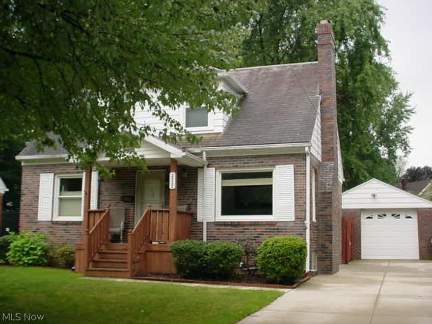 Shows well! 3 bed, 1 1/2 bath brick cape w/partially finished basement and enclosed porch! Woodburning fireplace in living room, formal dining room, kitchen with appliances! 1 bed on first floor with 1/2 bath! 2 large beds upstairs with full bath! Naturestone in basement, rec room & washer/dryer stay! Detached garage w/attached enclosed porch! Nicely landscaped privacy fenced back yard w/storage shed! Interior freshly painted! NICE!