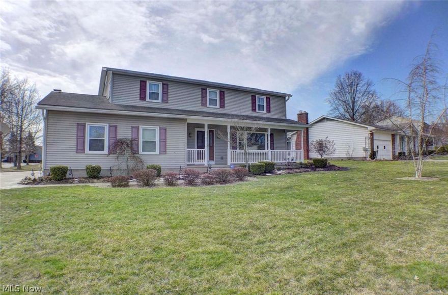 Wyoga Lake Estates Classic!  This home was custom built and lovingly maintained by the current owner.  It has been updated throughout the years always with care and quality.  The first floor features a large living room/dining room area, an eat in kitchen, large foyer with 1/2 bath and coat closet, family room with wood burning fireplace, and a LARGE 3 season sunroom that is perfect for entertaining.  Upstairs, the Master Suite features a walk in closet and a full bath.  The other 3 bedrooms feature deep closets and hard wood flooring.  This home sits high on a large lot.  The large concrete driveway features ample parking space and plenty of room to pull into the side entry garage with ease.   The 2.5 car garage is "neat as a pin" and features nature stone flooring.  The basement provides a nice laundry area and clean storage space.  There is also a 8 x 10 storage barn out back.  UPDATES:  Garage door 1994, Roof 1992, Windows 1996, Vinyl Siding and Entry doors 2004, Concrete drive and