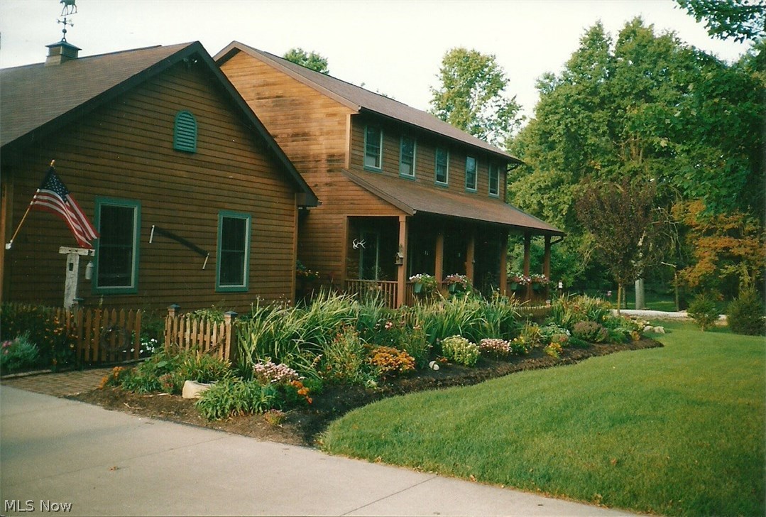 Custom built with quality throughout, this 3 bedroom, 2.5 bath home is a true beauty! The first floor boasts 9 foot ceilings, an office, laundry and cherry wood floors that accent both the foyer and the formal dining room. The amazing kitchen offers stainless steel appliances, lovely custom built Amish cherry cabinets, granite counters, a desk area, pantry, and a new vinyl floor. French doors from the kitchen/dinette lead to the awesome all season sun room with vaulted ceiling and windows galore, including bench w/storage. Entertainment is easy in the spacious great room or the casual finished rec room. All baths offer Amish, custom built, solid hickory wood vanities. The master suite features a walk-in closet w/organizer and master bath with granite, walk-in shower and Jacuzzi tub. New carpeting on the 2nd floor, hall & steps. Outside, you'll find beautiful illuminated landscaping with perennial flowers, stamped concrete patio, Cal Spa 7 person hot tub to enjoy the stars, barn