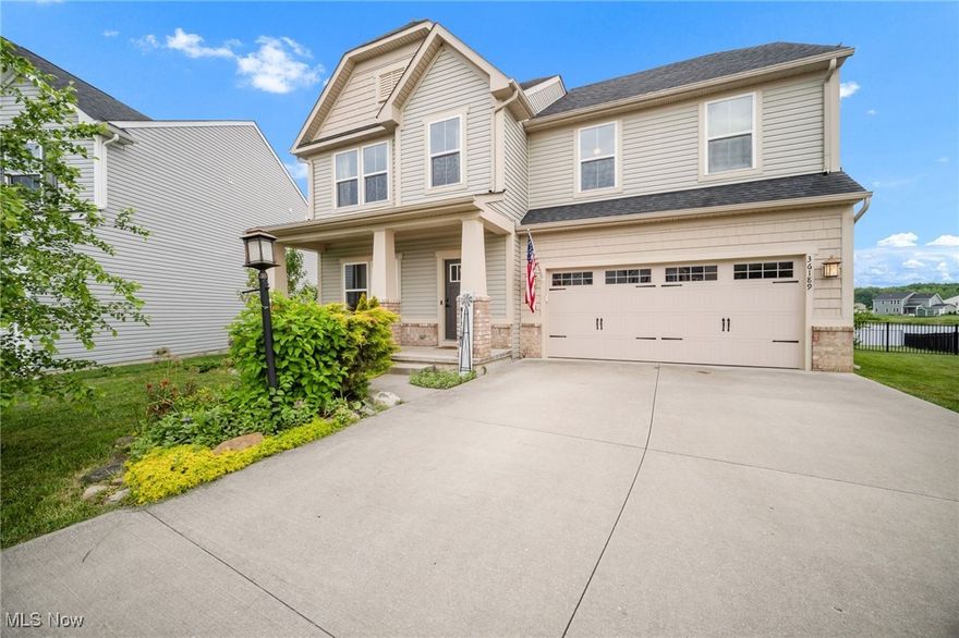 Welcome Home to Hampton Place!

Nestled in the heart of the beautifully landscaped Hampton Place community, this elegant 4-bedroom, 2.5-bath colonial offers the perfect blend of luxury and comfort. Located on a quiet cul-de-sac, this home is just 8 years young and move-in ready! Enjoy 3,030 sq ft of thoughtfully designed living space, featuring a formal dining room ideal for entertaining, a gourmet kitchen with a center island, and an adjoining morning room filled with natural sunlight. This home offers spacious bedrooms, including a master suite with an en-suite bathroom and two walk-in closets! A built-in Guardian Security system provides added peace of mind.

Step outside to enjoy your morning coffee on the charming front porch, or unwind by the serene lake in your own backyard. With lush greenery and peaceful ponds, the community is a quiet retreat from daily life. Enjoy peace of mind in a secure, fully fenced backyard—ideal for children and pets. The spacious basement is primed for transformation and ready for your creative vision. With plumbing already in place for a full bathroom, it's the perfect canvas to craft a functional and stylish retreat.

Conveniently located near top-rated schools, shopping, dining, the Metroparks, and major interstates — everything you need is just minutes away. Don't miss the opportunity to call this stunning home your own in one of the area's most sought-after neighborhoods! Sellers are offering a one-year home warranty. Schedule your showing today!