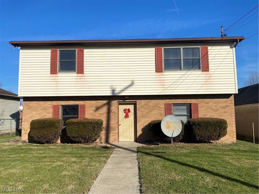 Very Nice Raised Ranch Home w/ a Built-In 2 Stall Garage, 2 Nice Sized Bedrooms 15X12 & 12X12, 2 Full Baths, Eat in Kitchen & a Very Nice Sized LR 18X14. This Home also has a 10X9 room in the LL that would make a great Home Office or whatever you may need it to be. Alley Access brings you into the driveway with a very nice Level Lot. This Neighborhood is conveniently located to many amenities including Grocery Stores, Schools, libraries, etc.  Call today for your Private Showing.